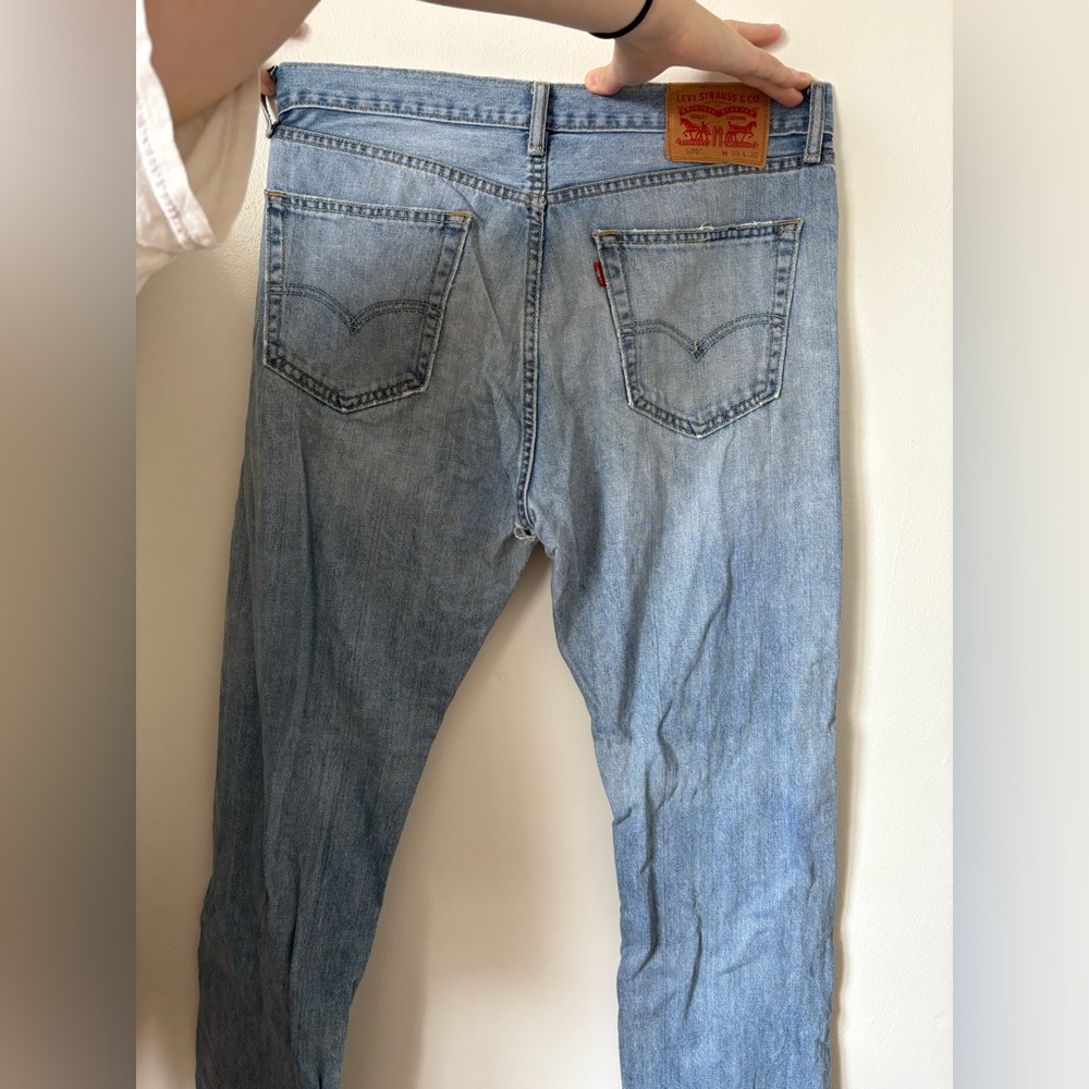 Levi's Blue Relaxed Fit Jeans with Vintage Appeal (small rip)